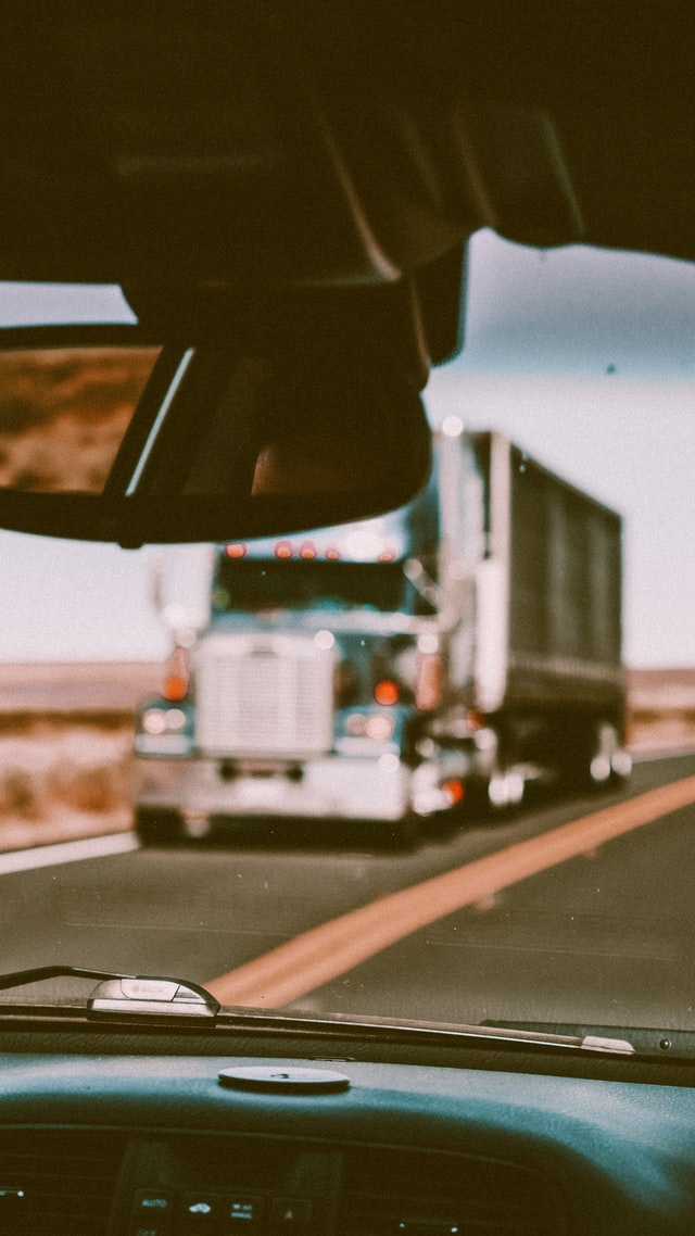 white truck on road during daytime