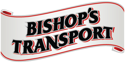 A white banner with red trim that reads Bishop's Transport.